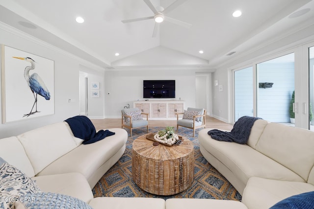 living room featuring vaulted ceiling, crown molding, ceiling fan, and light wood-type flooring