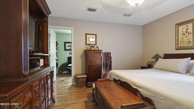 11413 Church Rd, Ebro, FL 32437 - bedroom with wood finished floors