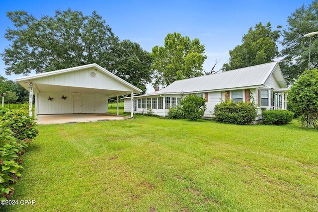 view of yard featuring a carport