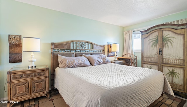 bedroom with a textured ceiling