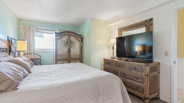 bedroom with a textured ceiling