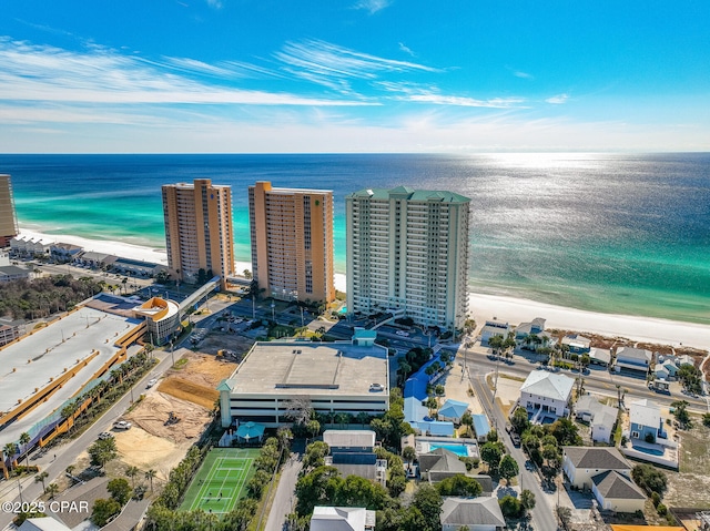 bird's eye view featuring a beach view and a water view