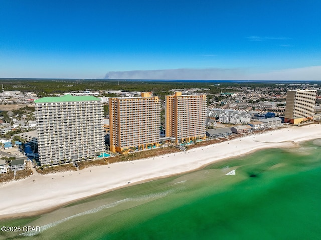 aerial view featuring a water view and a view of the beach