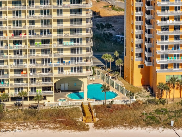 view of property with a community pool