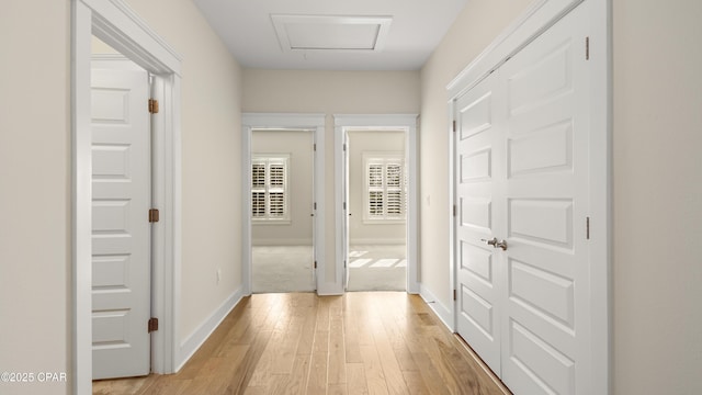 corridor featuring light wood-type flooring