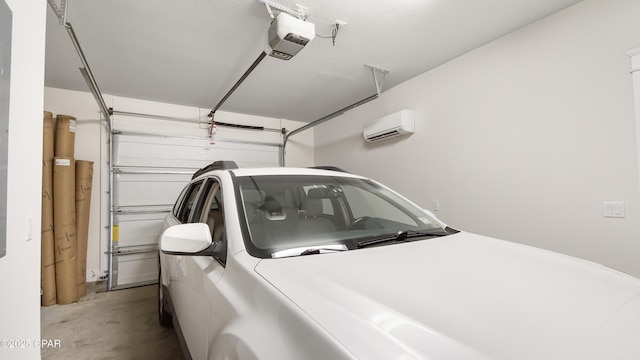 garage featuring a garage door opener and a wall mounted AC