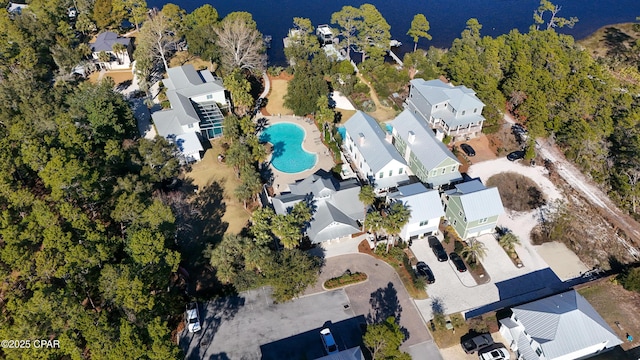 birds eye view of property featuring a water view