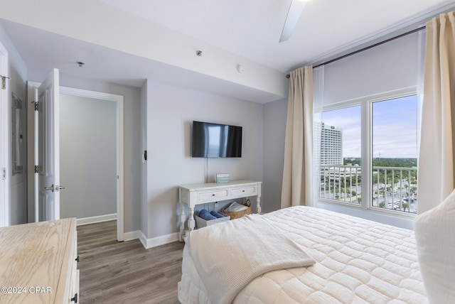 bedroom featuring ceiling fan and hardwood / wood-style floors