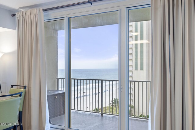 balcony featuring a water view