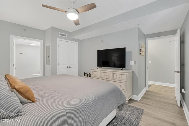 bedroom featuring hardwood / wood-style floors and ceiling fan