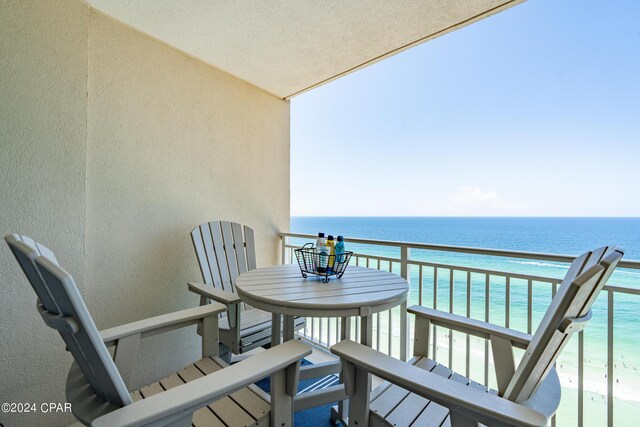 property view of water featuring a beach view