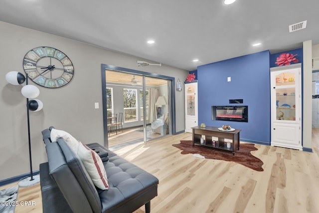 living area featuring light wood-type flooring