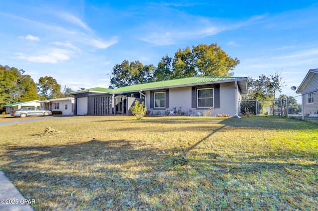 ranch-style house featuring a front lawn