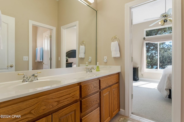 bathroom featuring ceiling fan and vanity