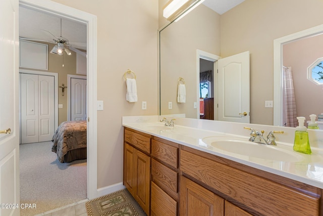 bathroom with vanity, ceiling fan, and tile patterned floors