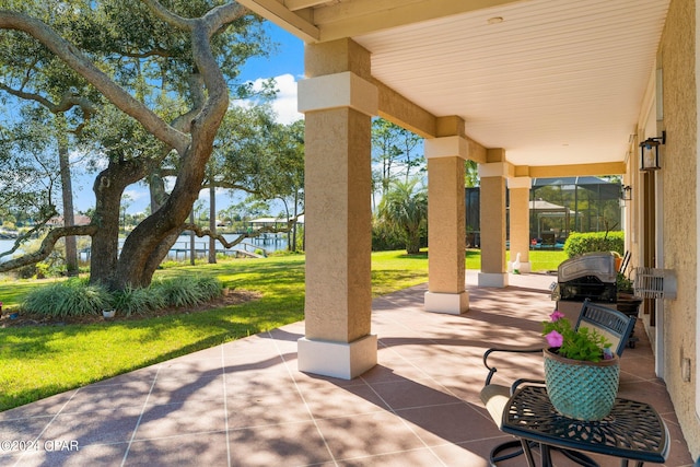 view of patio / terrace with a water view