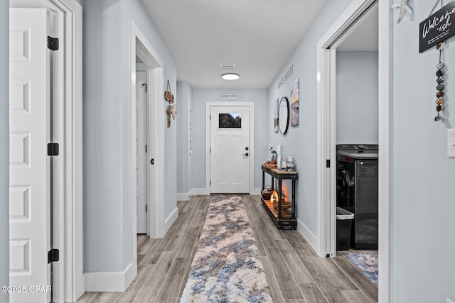 hall featuring light hardwood / wood-style flooring