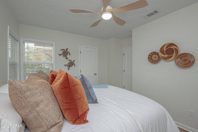 bedroom featuring ceiling fan