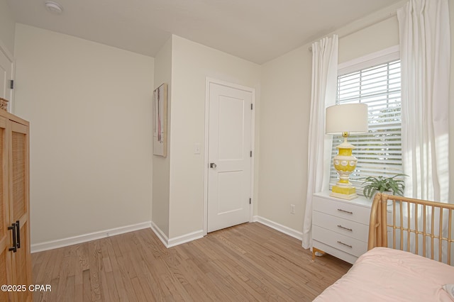 bedroom featuring light wood-type flooring