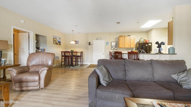 living room featuring light wood-type flooring