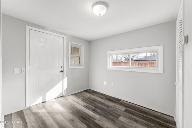 interior space featuring dark wood-type flooring