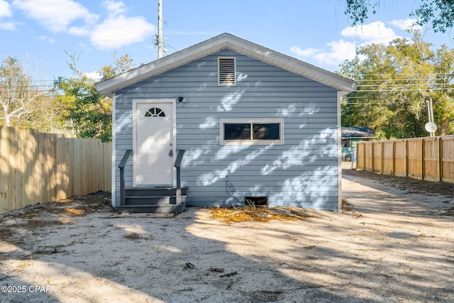 1905 W 17th St, Panama City, FL 32405 - back of property with entry steps and fence