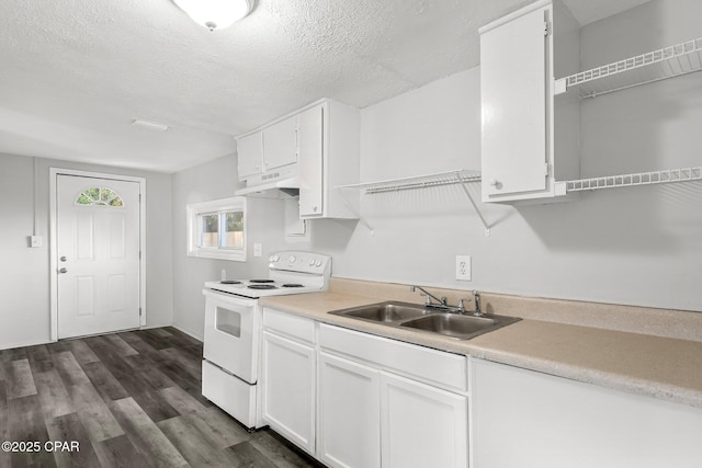 1905 W 17th St, Panama City, FL 32405 - kitchen with white cabinetry, under cabinet range hood, white range with electric stovetop, light countertops, and a sink