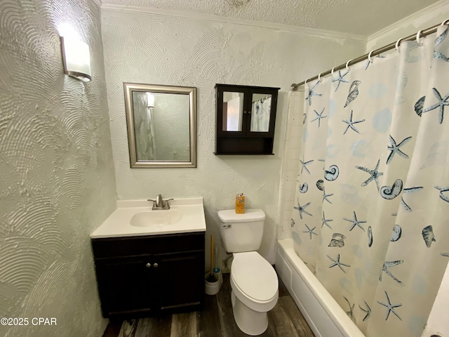 full bathroom with hardwood / wood-style flooring, vanity, a textured ceiling, toilet, and shower / bath combo with shower curtain