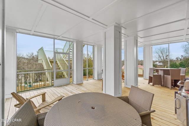 sunroom / solarium with a wealth of natural light