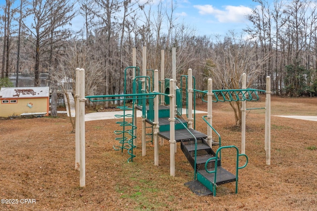 view of jungle gym with a lawn