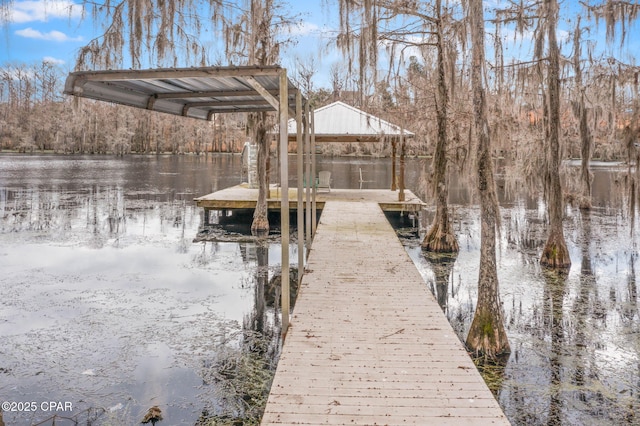 view of dock with a water view