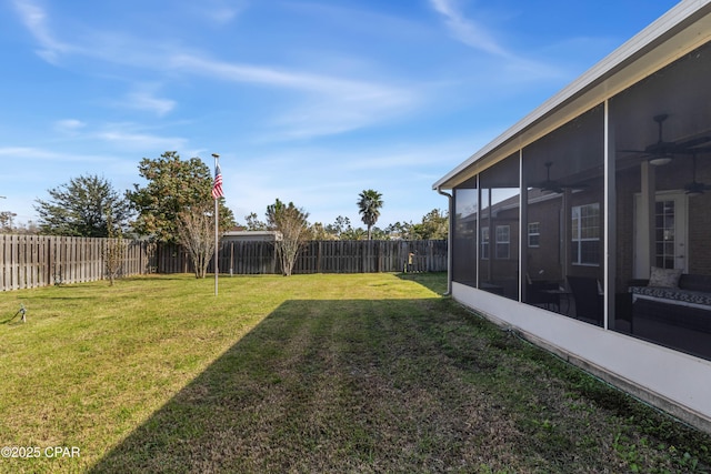 view of yard with a sunroom