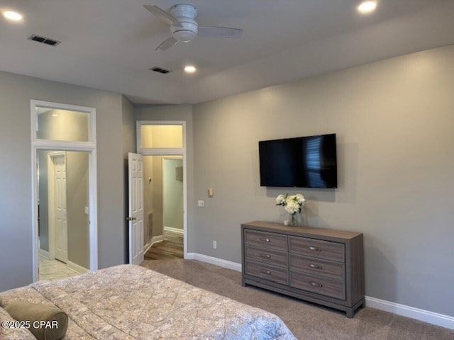 carpeted bedroom featuring ceiling fan