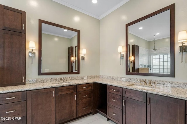 bathroom with vanity, ornamental molding, and walk in shower