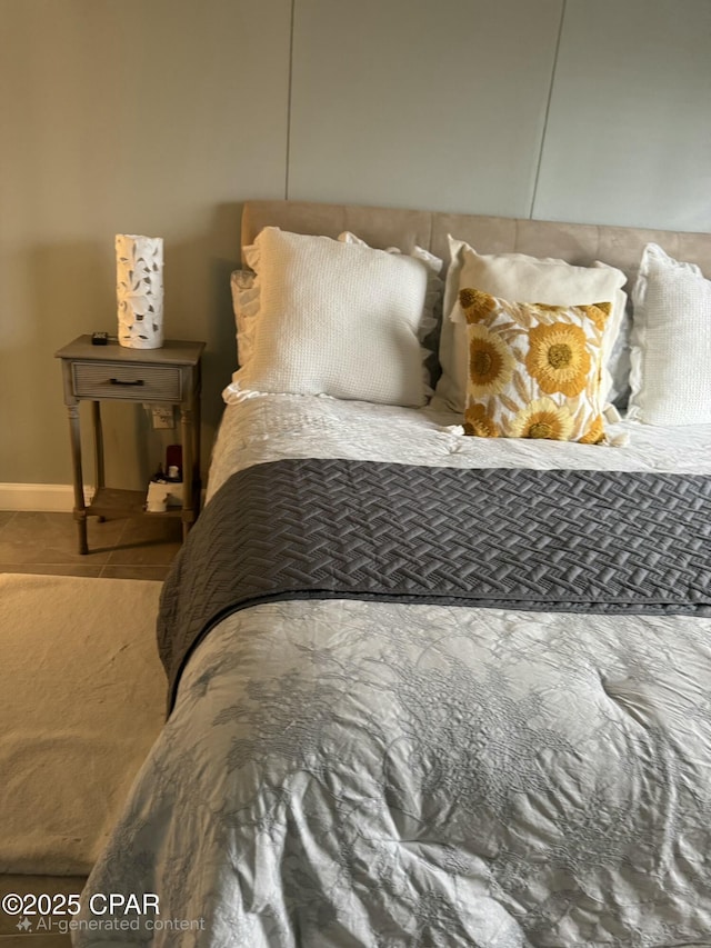 bedroom with tile patterned floors