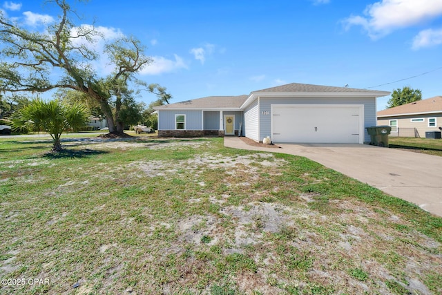 single story home featuring a garage and central AC