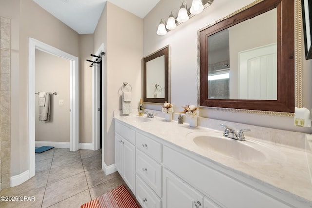 bathroom with vanity and tile patterned floors