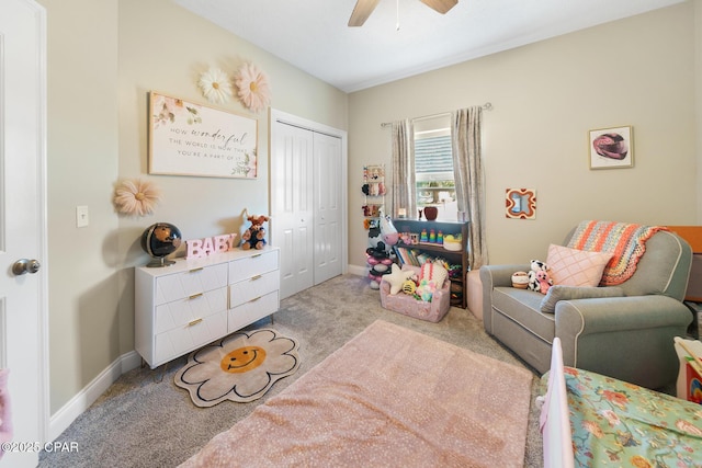 interior space with light colored carpet and ceiling fan