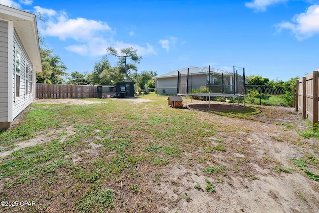 view of yard featuring a trampoline