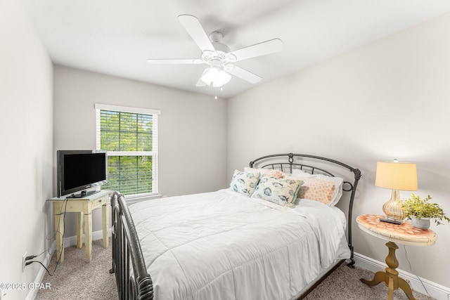 bedroom featuring ceiling fan and carpet flooring