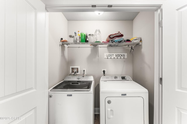 washroom with separate washer and dryer