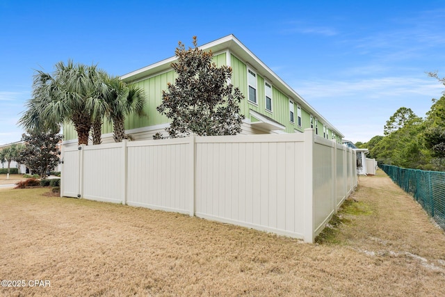 view of property exterior featuring a yard