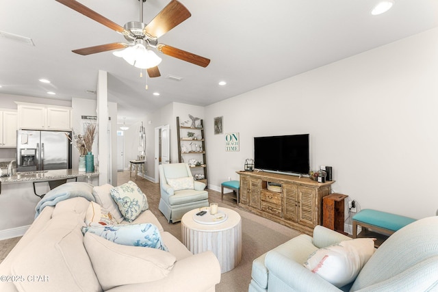 living room featuring ceiling fan