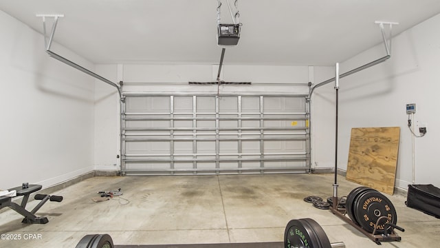 garage featuring a garage door opener