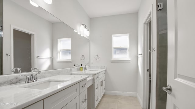 bathroom featuring vanity and tile patterned flooring