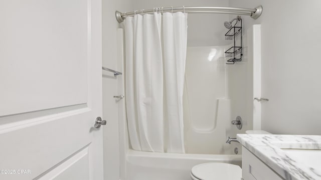 full bathroom featuring shower / tub combo with curtain, vanity, and toilet