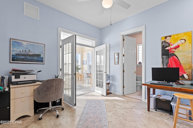 office area featuring light tile patterned floors, ceiling fan, visible vents, and french doors