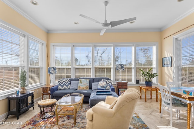 sunroom featuring a ceiling fan