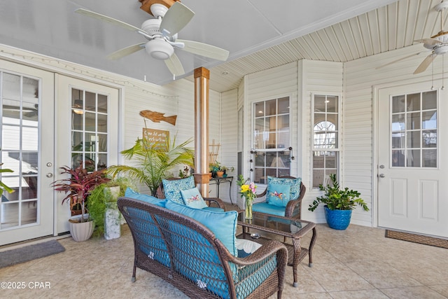 view of patio / terrace with french doors, ceiling fan, and an outdoor living space