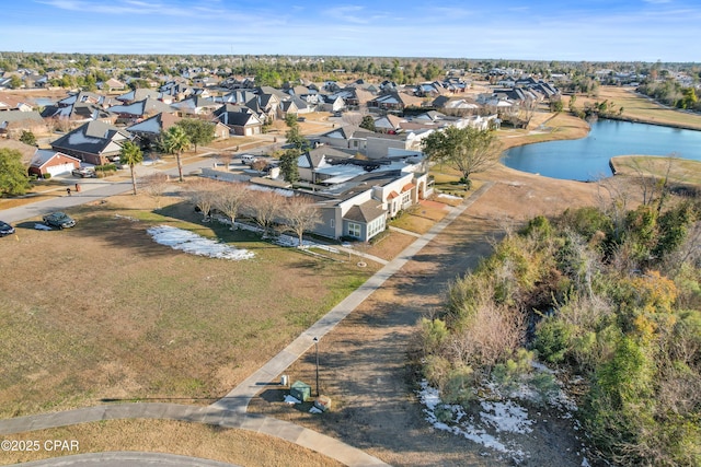 aerial view with a residential view and a water view